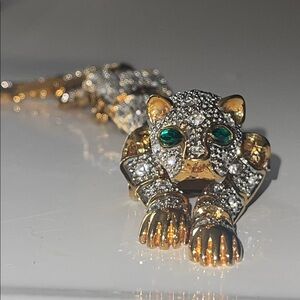 Elegant Gold and Silver Leopard Brooch with Green Accents